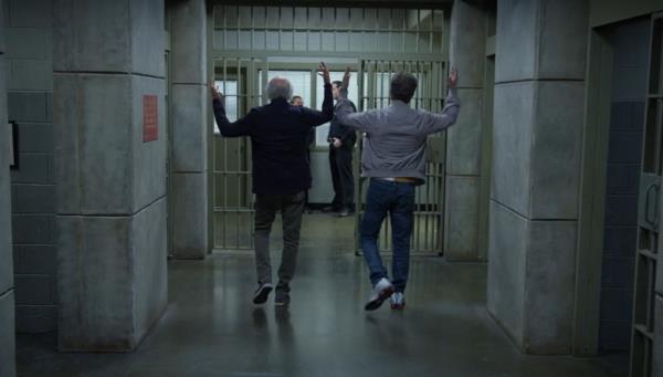 Larry David and Jerry Seinfeld leaving prison. 