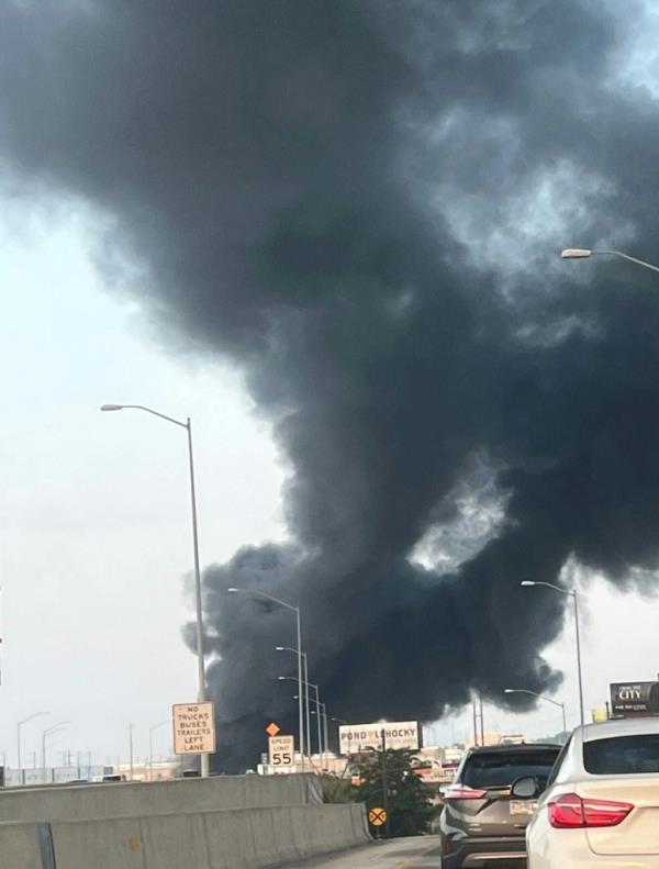 The fire caused by the tanker flipping over created dark plumes over Philadelphia on Sunday morning. 