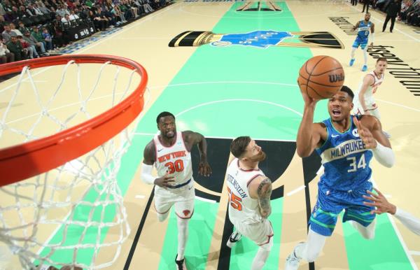 Giannis Antetokounmpo, who scored 35 points, goes up for a shot during the Knicks' 146-122 blowout loss to the Bucks, eliminating them from the NBA In-Season Tournament.
