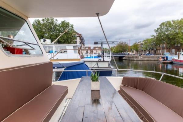  The outdoor seating area of hippo houseboat in london