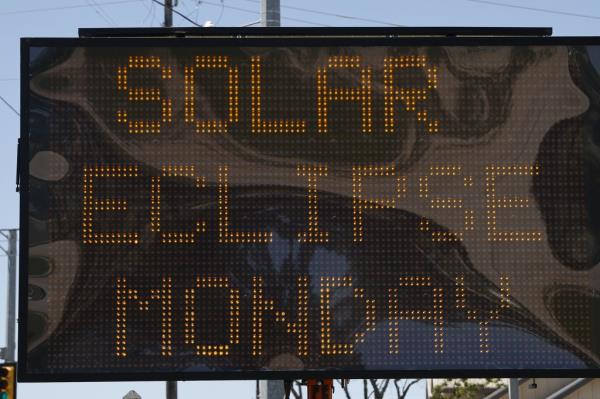 sign announcing eclipse