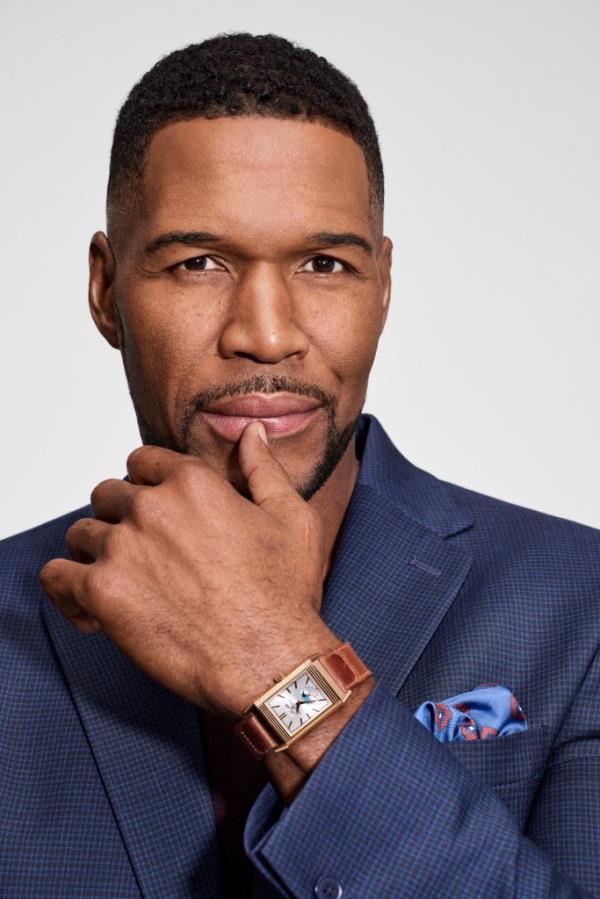 Michael Strahan custom suit, similar styles $370 at MensWearhouse.com and JCPenney.com; Jaeger-LeCoultre Reverso Tribute Duoface Calendar watch in 18-k pink gold, $29,400 at Lo<em></em>ndon Jewelers, 2046 Northern Blvd., Manhasset, LI