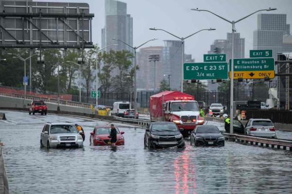 Cars in high flooded waters on FDR Drive in NYC last week.