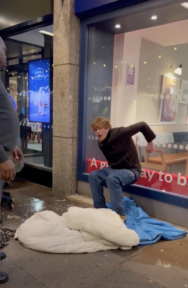 Footage of the ordeal showed the security guard suddenly kicking the man's blankets away before using the mop to douse the sidewalk with soapy water.