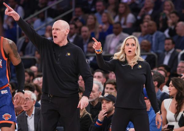 Indiana Pacers head coach Rick Carlisle and assistant coach Jenny Boucek react during the second half during game five.