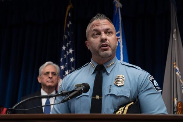 Attorney General Merrick Garland listened as Minneapolis Police Chief Brian O'Hara spoke a<em></em>bout how his department will comply with the DOJ investigation at a press conference. 