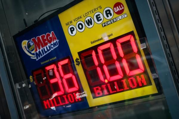 Electric newsstand sign advertising the $1 billion lottery jackpot.