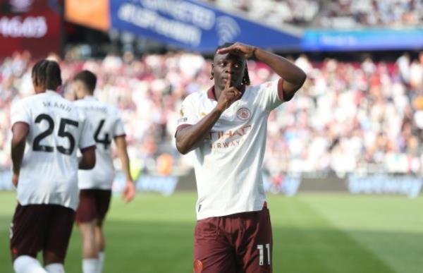 Manchester City's Jeremy Doku celebrates scoring his side's first goal during the Premier League match between West Ham United and Manchester City at Lo<em></em>ndon Stadium on September 16, 2023 in London, England. (Photo by Rob Newell - CameraSport via Getty Images)