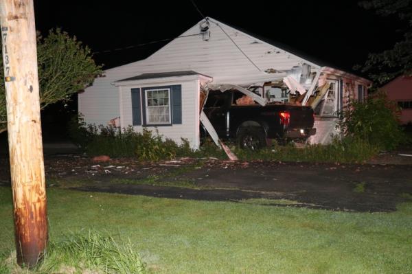 A 21-year-old drunk driver crashed his pickup truck into a home in the town of Wheatfield, NY early Saturday morning.