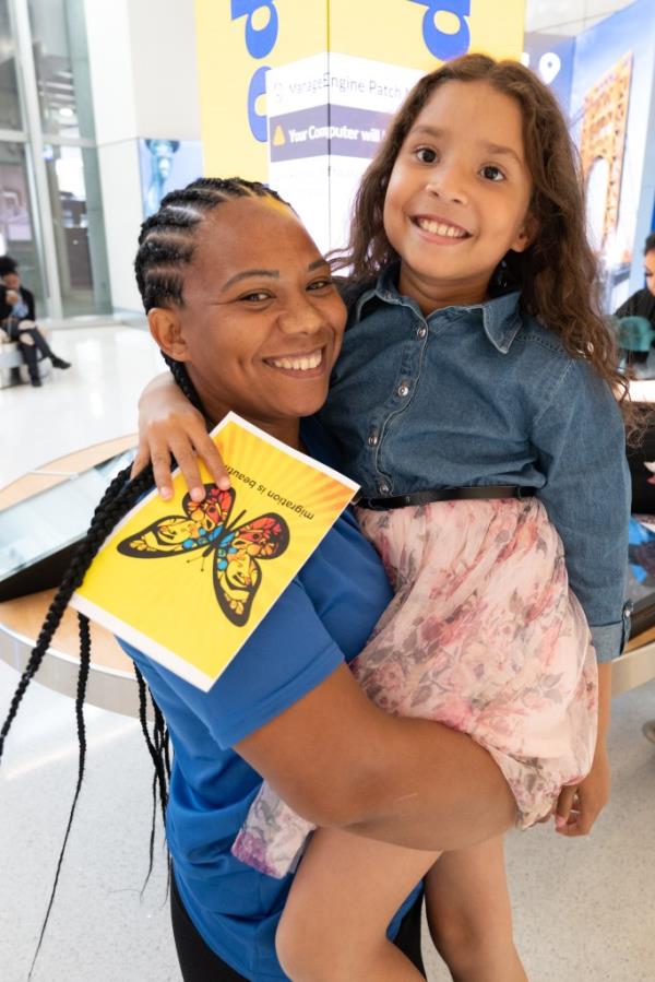 Osleydy Alvarez holds her 10-year-old niece, Isabella Villa Briseno, after the family was reunited at LaGuardia Airport on Thursday. The girl and her sister, Isabella Villa Briseno, were separated from her aunt and cousins at the US border. 