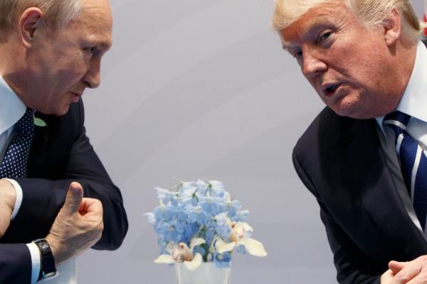 Former President Do<em></em>nald Trump meets with Russian President Vladimir Putin at the G20 Summit in Germany on July 7, 2017.