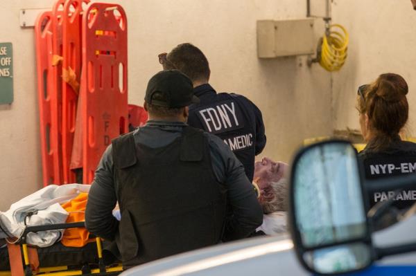 Epstein's body being brought into Downtown Hospital in Manhattan on Aug. 11, 2019.