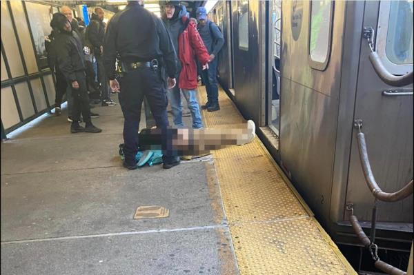 a shooting victim lying on the platform at the Mt Eden Ave Station & Jerome Ave