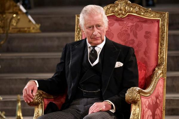 king Charles sitting on a throne. 