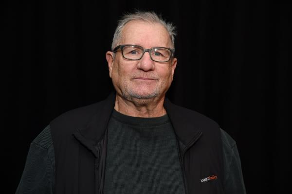 Ed O'Neill smiling. 