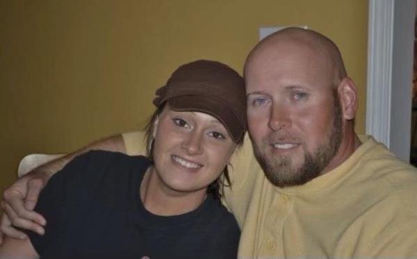 This fall 2010 family photo shows Aaron James and his wife, Meagan, before his June 2021 high-voltage electricity accident. Aaron was working for a power line company in June 2021 when he was shocked by a live wire. He nearly died. Ultimately he lost his left arm, requiring a prosthetic. His damaged left eye was so painful it had to be removed. Multiple reco<em></em>nstructive surgeries couldn?t repair extensive facial injuries including his missing nose and lips. (NYU Langone Health via AP)