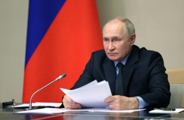 Russian President Vladimir Putin chairs a meeting of members of his Security Council and the government and the heads of law enforcement agencies, at the Novo-Ogaryovo state residence outside Moscow, Russia October 30, 2023. Sputnik/Gavriil Grigorov/Pool via REUTERS ATTENTION EDITORS - THIS IMAGE WAS PROVIDED BY A THIRD PARTY.