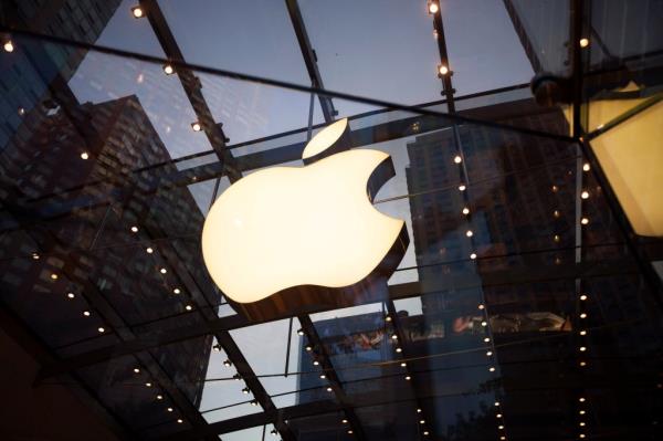 The Apple Inc. logo is displayed at the Upper West Side Apple store in New York, U.S., on Sunday, July 20, 2014. Apple Inc. is expected to release earnings data on July 22.