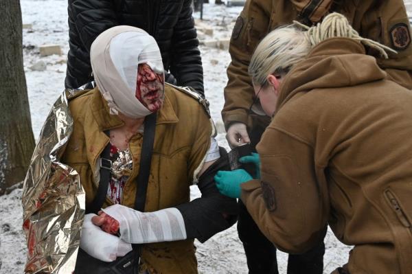 Medics work to treat a soldier wounded by a Russian missile strike in Kharkiv. 