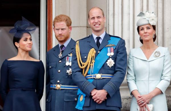 Prince Harry, Duke of Sussex, Meghan, Duchess of Sussex, Prince William, Duke of Cambridge and Catherine, Duchess of Cambridge on Buckingham Palace balcony watching RAF flypast.