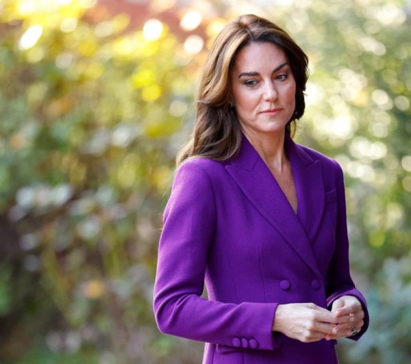 Catherine, Princess of Wales arrives at the Shaping Us Natio<em></em>nal Symposium at the Design Museum in Lo<em></em>ndon wearing a purple suit.