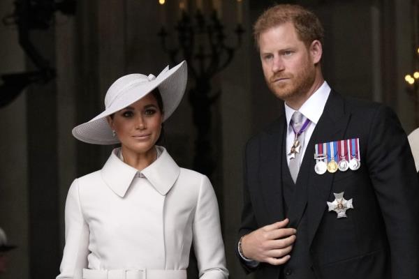 Prince Harry and Meghan Markle, Duke and Duchess of Sussex leave after a service of thanksgiving for Queen Elizabeth II at St. Paul's Cathedral.