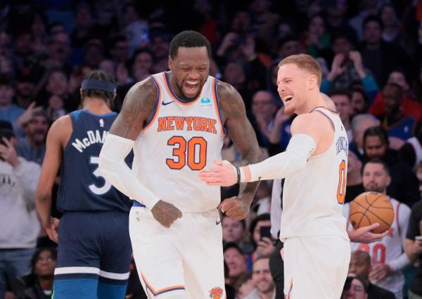 Knicks forward Julius Randle #30 reacts a long side New York Knicks guard Do<em></em>nte DiVincenzo #0 after scoring and pulling a foul during the fourth quarter. 