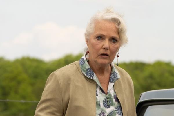 A horrified Mary Goskirk looks at Faye in her car in Emmerdale