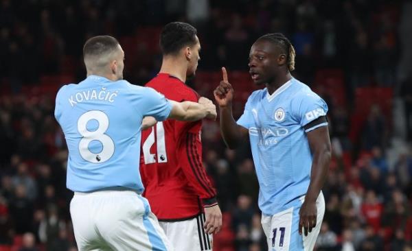 Antony and Jeremy Doku during the Manchester derby