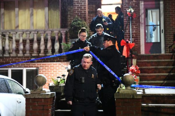 Cops investigate at a home wher<em></em>e a woman was killed in Bay Ridge, Brooklyn.
