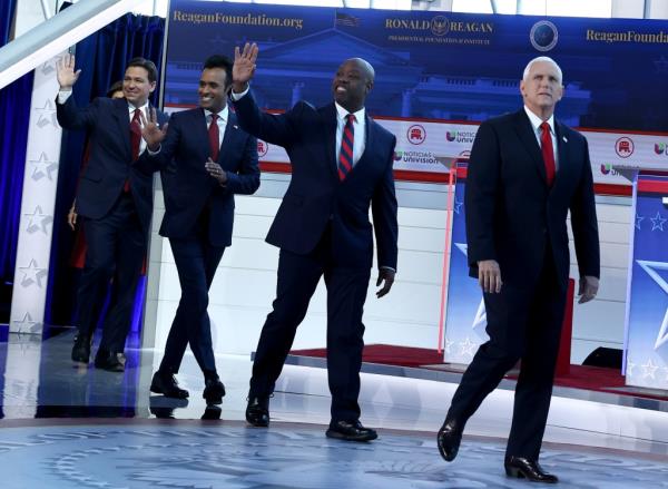 Republican presidential candidates (L-R), Florida Gov. Ron DeSantis, Vivek Ramaswamy, U.S. Sen. Tim Scott (R-SC) and former U.S. Vice President Mike Pence walk on stage during the FOX Business Republican Primary Debate at the Ro<em></em>nald Reagan Presidential Library on September 27, 2023 in Simi Valley, California.