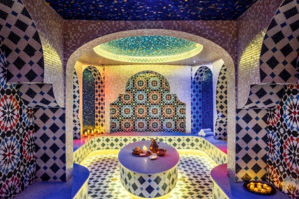 Image of World Spa's Moroccan Hammam, a tiled room with bright colors.