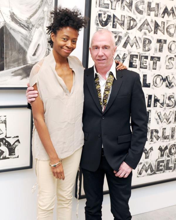 Artist Kara Walker poses with Brent Sikkema in front of her art at a solo show in 2011