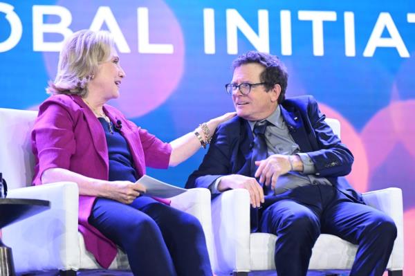 Former US Secretary of State Hillary Clinton and Michael J. Fox speak o<em></em>nstage during the Clinton Global Initiative September 2023 Meeting at New York Hilton Midtown on Sept 19, in New York City. 