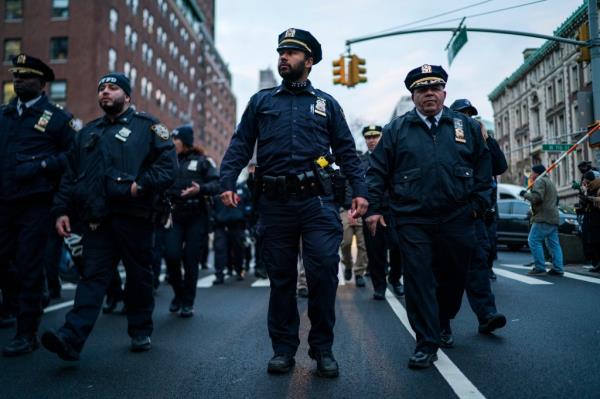 NYPD officers detaining pro-Palestinian demo<em></em>nstrators during a protest near Columbia University, New York City.