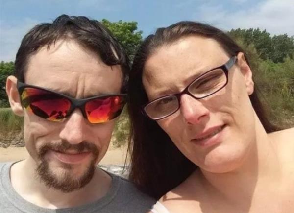 A wife is lucky to be alive after her mobility scooter was hit by a giant wave on a trip to the seafront with her husband. Tina Thomas, 44, was engulfed and nearly swept out to sea by the crashing wave as she sat on her scooter next to her husband Ashley and their dog Apollo. Tina and Ashley, 46 (pictured together) didn't spot the danger of the choppy water - and had no idea it would wash over the walkway at Swansea Marina. She feared she would be drowned when she was thrown out of her seat by the huge wave as she was on her ?5,000 mobility scooter. WALES NEWS SERVICE