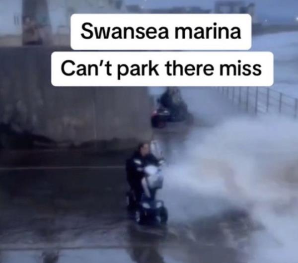A wife is lucky to be alive after her mobility scooter was hit by a giant wave on a trip to the seafront with her husband. Tina Thomas, 44, was engulfed and nearly swept out to sea by the crashing wave as she sat on her scooter next to her husband Ashley and their dog Apollo. Tina and Ashley, 46, didn't spot the danger of the choppy water - and had no idea it would wash over the walkway at Swansea Marina. She feared she would be drowned when she was thrown out of her seat by the huge wave as she was on her 5,000 mobility scooter. WALES NEWS SERVICE