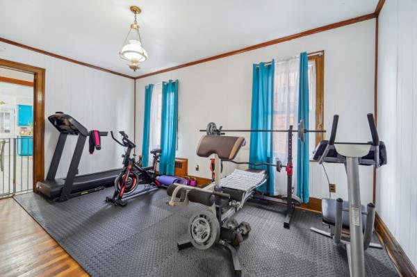 A bedroom turned into a gym.