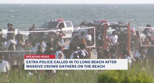 Teens swarm sand on Long Beach. 