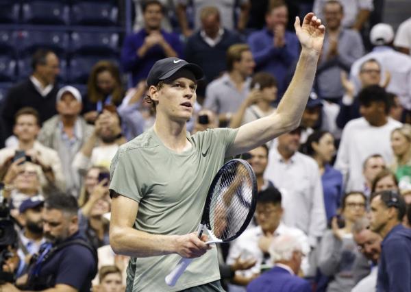 Jannik Sinner waves to the crowd after his U.S. Open quarterfinal win over Daniil Medvedev on Sept. 4, 2024.