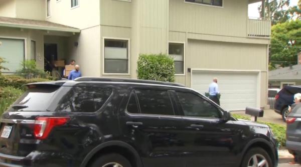 FBI agents at Thao's house during the raid on Thursday morning.