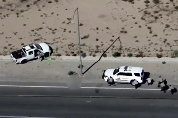 Police car on the road during the San Bernardino County Sheriff’s Department incident involving the fatal shooting of a teenager