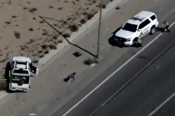 San Bernardino County Sheriff's Department police car on the road during a confrontation