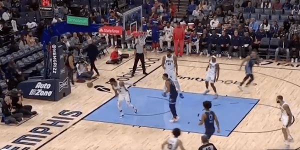 Paul George injured his knee going up for a rebound.