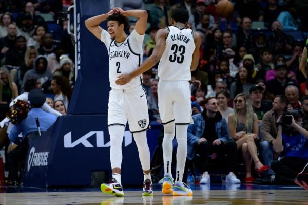 Brooklyn Nets forward Cameron Johnson (2) reacts after attempting to dunk after New Orleans Pelicans forward Brandon Ingram (14) stole the ball during the first quarter at Smoothie King Center.