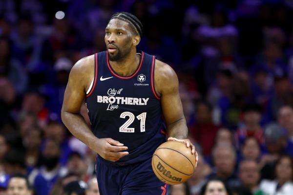 Joel Embiid #21 of the Philadelphia 76ers dribbles during the third quarter against the Detroit Pistons at the Wells Fargo Center on April 09, 2024 in Philadelphia, Pennsylvania.