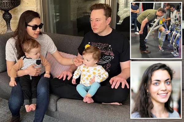 Elon Musk is seen with one of his nine children at an event in Miami in May.