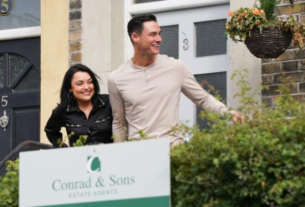 Whitney and Zack outside their house in EastEnders