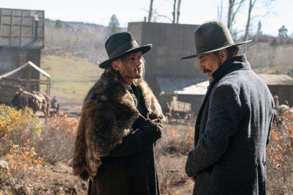 Jamie Campell Bower and Kevin Costner in Western garb