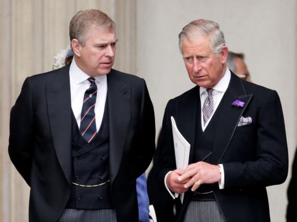 Prince Charles and Prince Andrew in suits at Queen Elizabeth II's Diamond Jubilee Service at St Paul's Cathedral, London, 2012.